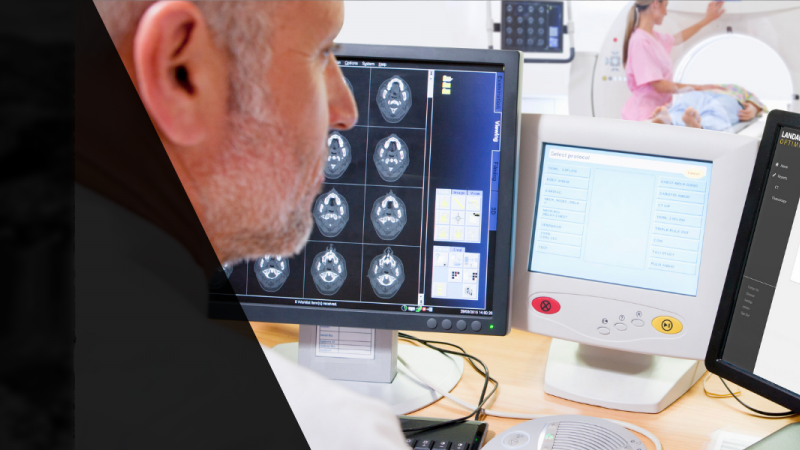 Radiologist Using Radiation Dose Monitoring Software 