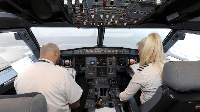 Pilots working on Flight Plan