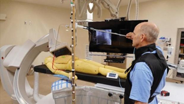 Technician reviewing an X-ray machine