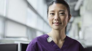 Medical Professional wearing a dosimeter