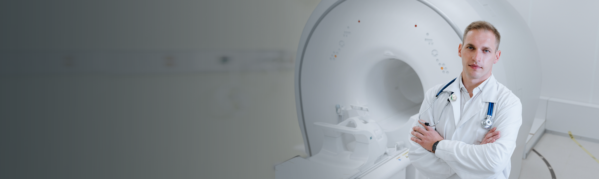 Physician working with MRI machine