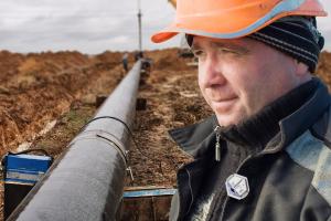 Industrial worker wearing a Luxel dosimetry badge